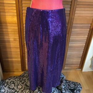Scoop sequined purple midi length skirt with back split. Size M.  NWOT